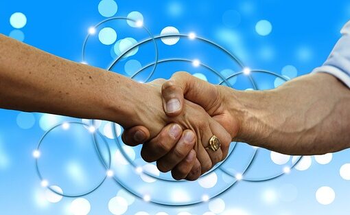 共感 して握手、オキシトシン 出し方の写真