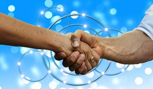 共感 して握手、オキシトシン 出し方の写真